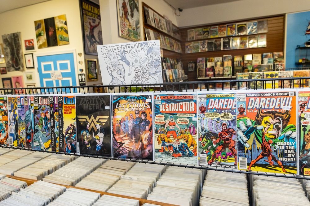 Back issue comics on the rack at Comic Book Hideout